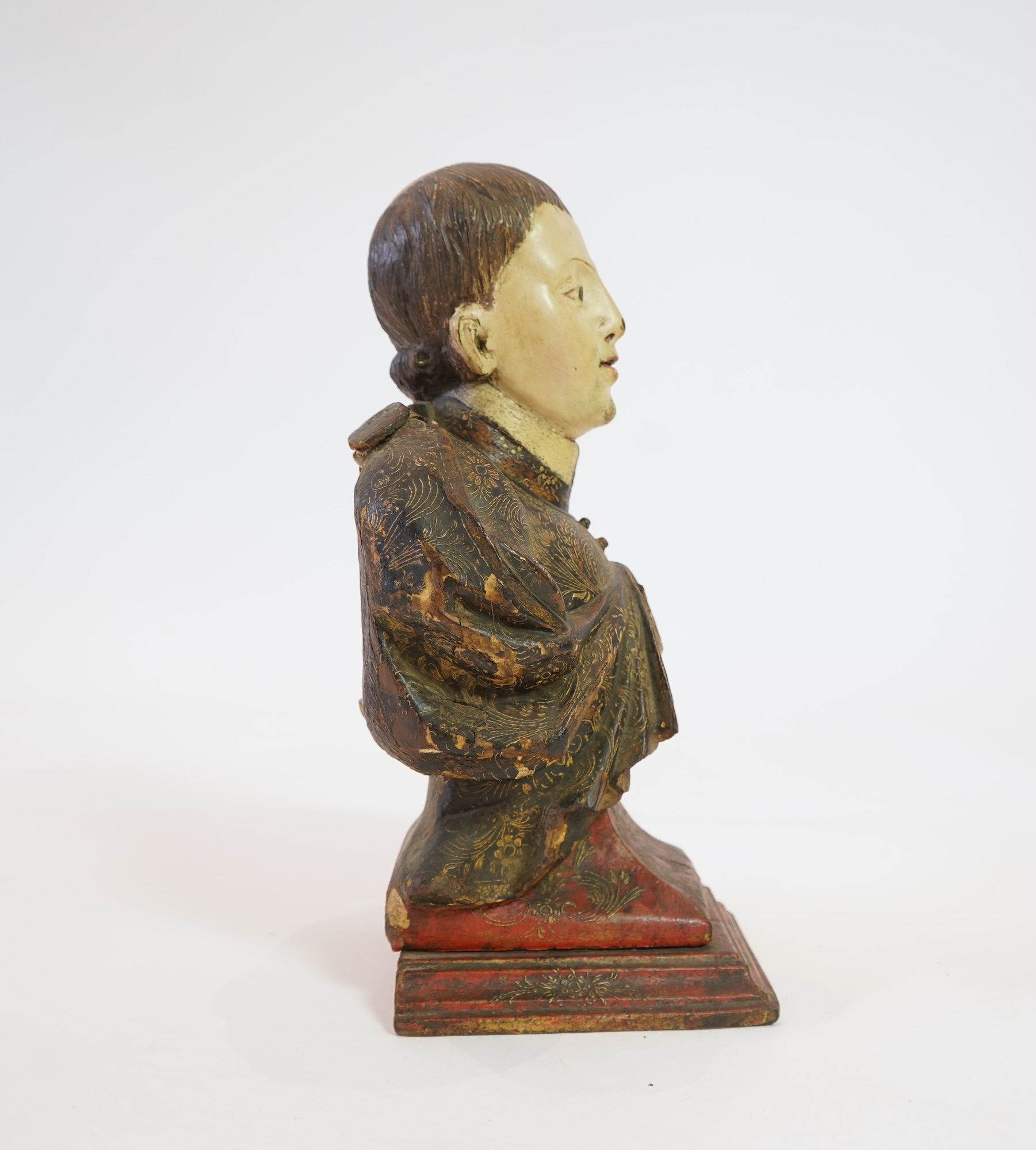 A 19th century Spanish polychrome wood bust of a Saint